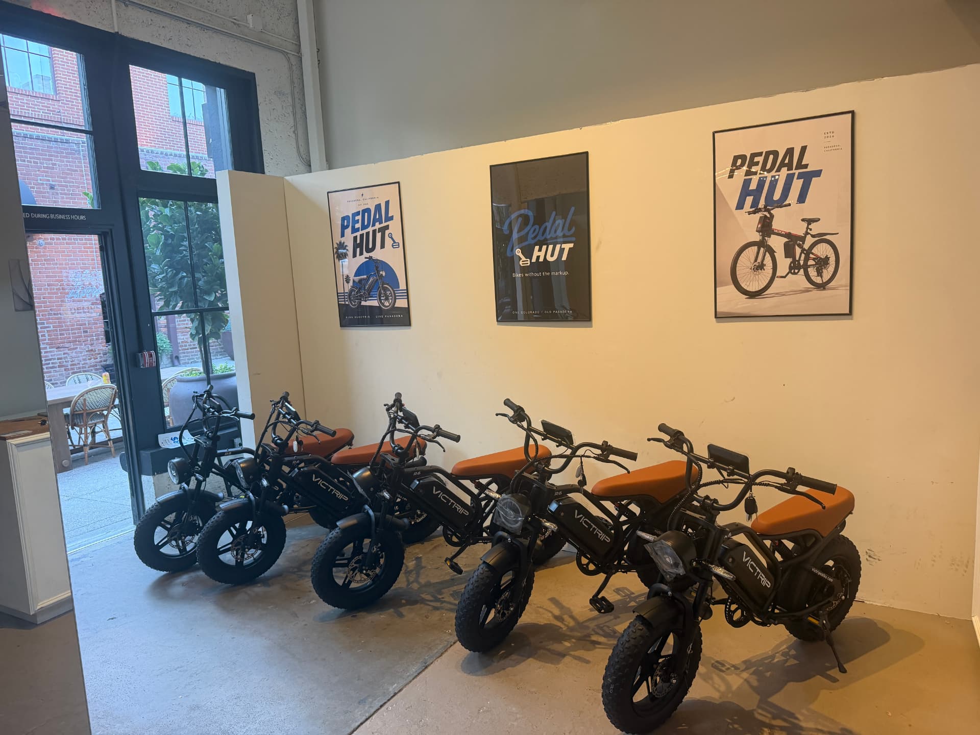 E-bikes lined up inside the Pedal Hut showroom
